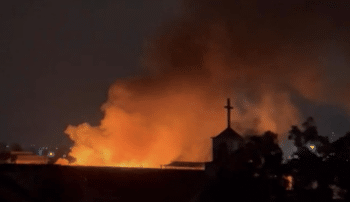 | Fire and smoke are seen against a church in Manipur Photo TwitterMangteC | MR Online