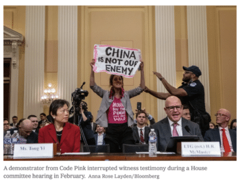 | To illustrate its article the Times published a picture of a Code Pink activist holding up a sign with the subversive message China is not our enemy | MR Online