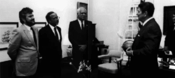 Ronald Reagan meeting with Contra leaders Oliver North stands behind Reagan in the background Source dougmichaeltruthcom