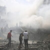 Palestinians look for survivors after an Israeli airstrike in Rafah refugee camp in the southern Gaza Strip on October 12th, 2023.