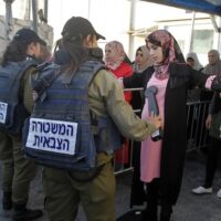 | Palestinians pass through an Israeli checkpoint between Bethlehem and Jerusalem in the occupied West Bank Photo Getty imagesFile photo | MR Online