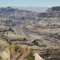 Much of what you can see in this photo is Hualapai land but the tribe cannot use any of the water. Taken along the west rim of the Grand Canyon, you can see the shrinking Colorado River in the canyon. CC-BY-SA © Donald Hall / Flickr.com