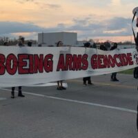 Young activists blocking the entrances to Boeing Building 598 in Missouri (Photo: Peyton Wilson)