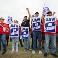 Members of the United Auto Workers Local 230 and their supporters walk a picket line in Ontario, California on September 26, 2023. (Photo: Patrick T. Fallon/AFP via Getty Images)