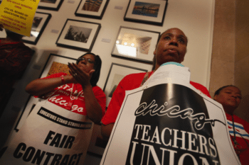 | Striking CTU teachers gather outside the office of Mayor Rahm Emanuel in Chicago | MR Online's City Hall to attend a press conference by the Chicago Teachers Solidarity Campaign on September 17, 2012. PHOTO BY SCOTT OLSON/GETTY IMAGES