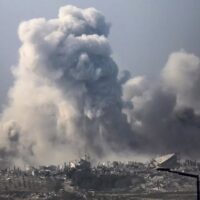 Smoke billows after an Israeli strike in the southern Gaza Strip near the Israel border, 4 December 2023 (AFP)