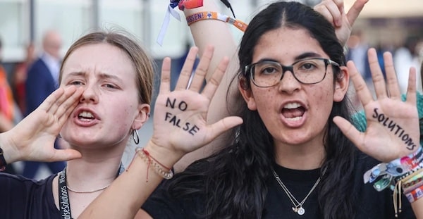  | Activists protest against fossil fuels on the sidelines of the United Nations Climate Change Conference in Dubai United Arab Emirates on December 5 2023 Photo by Karim SahibAFP via Getty Images | MR Online