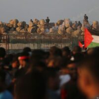 Israeli forces attack Palestinians protesting at the Gaza border on 11 September 2018 [Mohammed Asad/Middle East Monitor]