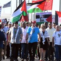 DEEDS NOT JUST WORDS: The march in Havana headed by Cuba's President Miguel Diaz-Canel, in the blue t-shirt, and Prime Minister Manuel Marrero Cruz in the grey t-shirt Photo: Trabajadores/Joaquin Hernández Mena