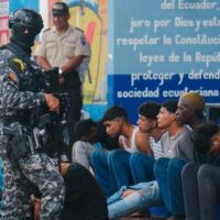 Military personnel stands guard at Canela Radio in Quito. Photo by Franklin Jacome/Agencia Press South.