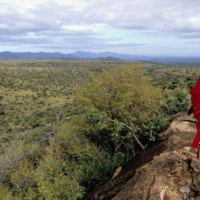 A Maasai man on tribal-managed lands. HEMIS / ALAMY STOCK PHOTO