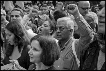 Benedicto Martínez marches in a demonstration of independent trade unions farmer organizations and the left wing Party of the Democratic Revolution to Mexico City's main square, the Zocalo, on the 20th anniversary of the implementation of NAFTA. The march included members of U.S. and Canadian unions and organizations protesting NAFTA. (David Bacon)