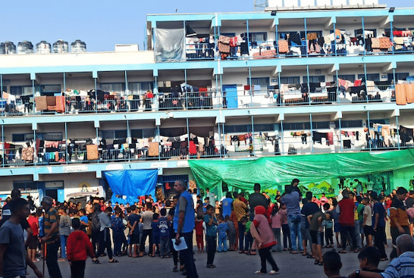 MR Online | Thousands of displaced Palestinians are living in UNRWA shelters Photo via KinderUSA | MR Online