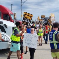 In July 2023, in the middle of Amazon’s Prime Day promotional sales rush, 100 warehouse workers walked out for more than three hours at its delivery station in Pontiac, Michigan—bringing the facility to the brink of a total shutdown. Photo: Zach Rioux