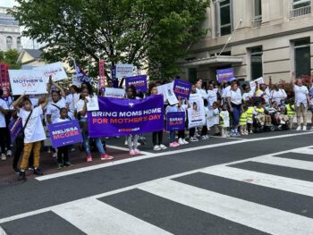 | Children and caregivers leading the FreeHer march | MR Online