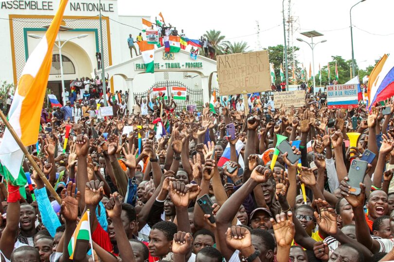 | Nigeriens demonstrate during a rally at the Place de la Concertation in front of the headquarters of the National Assembly on 20 August 2023 in Niamey They are supporting the National Council for the Safeguard of the Party CNSP which is threatened with military intervention by the Economic Community of West African States ECOWAS following their coup against the democratically elected president Mohamed Bazoum who is being held captive in his presidential residence Photo by Souley AbdoulayeAfrikimages AgencyUniversal Images Group via Getty Images | MR Online