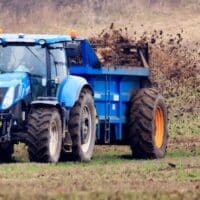 A farmer spreading fertiliser on a field in North Yorkshire, March 10, 2021