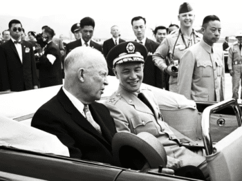 Dwight Eisenhower rides in a motorcade with Chiang Kai Shek in Taiwan in the early 1950s Source new life movementfandomcom