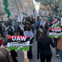 United Auto Workers members at the University of California marched in Oakland. Attacks on campus occupations have led to unfair labor practice charges and even a strike vote. Photo: UAW Local 2865.