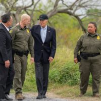 President Joe Biden speaks with border agents while walking along the U.S.-Mexico border in Brownsville, Texas, February 29, 2024.