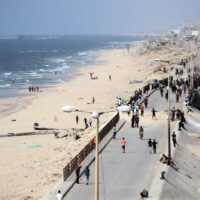 A SHIP TRANSPORTING INTERNATIONAL HUMANITARIAN AID IS MOORED AT THE US-BUILT TRIDENT PIER NEAR NUSEIRAT IN THE CENTRAL GAZA STRIP ON MAY 21, 2024. (PHOTO: STRINGER/APA IMAGES)