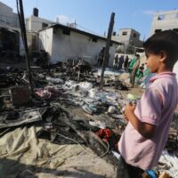 PALESTINIANS INSPECT THE SITE OF ISRAELI STRIKE THAT HIT A TENT AREA IN THE COURTYARD OF AL AQSA MARTYRS HOSPITAL IN DEIR AL BALAH, GAZA STRIP, SUNDAY, AUG. 4, 2024. THE STRIKE KILLED SEVERAL PEOPLE INCLUDING A WOMAN AND INJURED OTHERS, HEALTH OFFICIALS CONFIRMED. (PHOTO BY OMAR ASHTAWY/APAIMAGES_