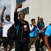 Phones held aloft to record the moment, delivery drivers marched on their bosses at three Amazon contractors to announce their new union. “To march today and walk in there with everyone behind us, all of us standing together as a union, it was so amazing,” said Latrice Shadae Johnson. Photo: Teamsters