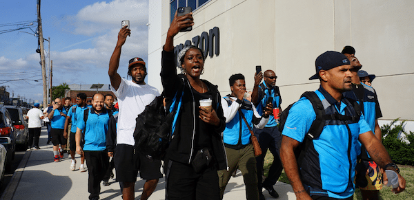 | Phones held aloft to record the moment delivery drivers marched on their bosses at three Amazon contractors to announce their new union To march today and walk in there with everyone behind us all of us standing together as a union it was so amazing said Latrice Shadae Johnson Photo Teamsters | MR Online