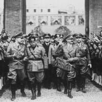 Fascist dictators Adolf Hitler and Benito Mussolini arrive at Massenzio Hall in Rome, Italy, on May 5, 1938. (Keystone / Getty Images)