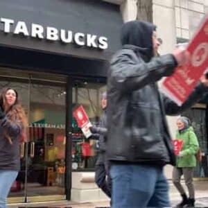 MR Online | Baristas at the Court House Starbucks in Northern Virginia picketed their store on Christmas eve Photo John ZangasDCMediaGroup | MR Online