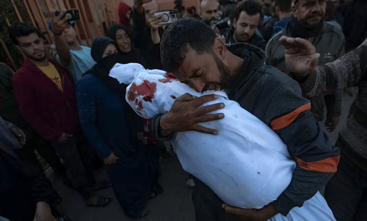 | A father mourns his son killed in an Israeli airstrike Nasser Hospital Khan Yunis southern Gaza Strip November 23 2024 Haitham ImadAAP | MR Online