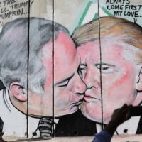  | A massive mural of Israeli Prime Minister Benjamin Netanyahu and US President Donald Trump engaged in a passionate kiss was unveiled Sunday morning October 29 2017 painted on the West Bank security barrier near the West Bank city of Bethlehem REUTERSMussa Qawasma | MR Online