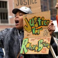 People gather at a rally for Robert Brooks on Jan. 2 in New York City. Brooks died after he was assaulted by New York corrections officers at Marcy Correctional Facility in December 2024. SHAWN INGLIMA/NEW YORK DAILY NEWS, VIA ZUMA PRESS WIRE