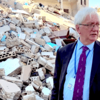 Craig Murray in rubble in Baalbek, Lebanon, Nov. 22, 2024. (Niels Ladefoged via craigmurray.org.uk)