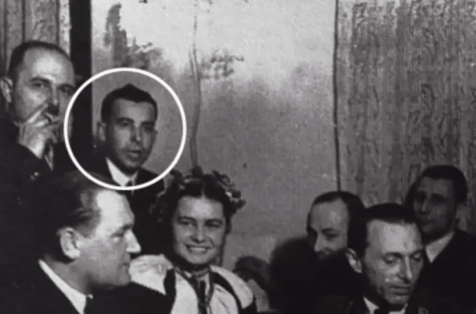 Chrystia Freelands grandfather Michael Chomiak at a partyhe is to the right of the man smoking a cigarette In the lower right corner of the photo in uniform is Emil Gassner the Nazi administrator in charge of the press for the region Source theprogressreportca