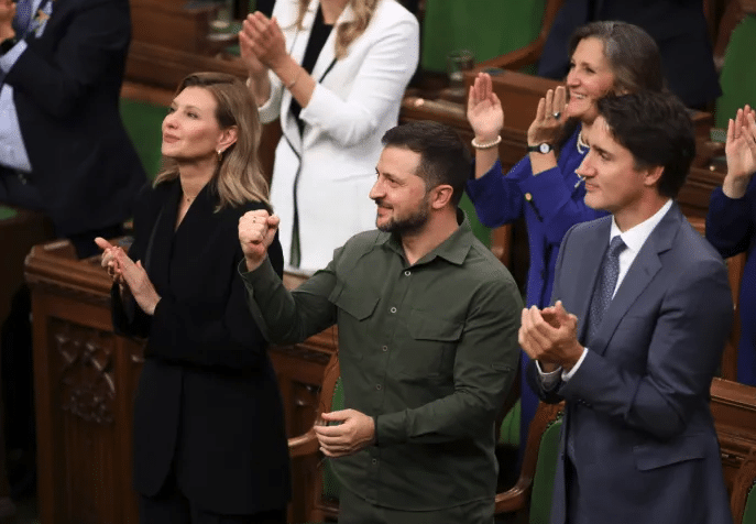 Volodymyr Zelensky and Justin Trudeau join a standing ovation for the Nazi veteran Chrystia Freeland is in the blue blazer Source independentcouk