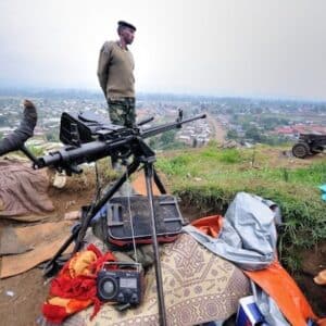 MR Online | An M23 soldier stands guard overlooking Bunagana a small town in North Kivu Province in the eastern Democratic Republic of the Congo Photo by Al JazeeraFlickr | MR Online