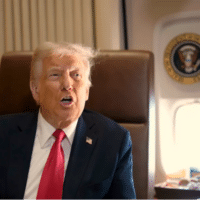 U.S. President Donald Trump speaks to reporters onboard Air Force One on February 9, 2025. [Photo: Ben Curtis/AP]