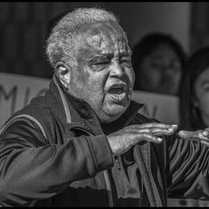 MR Online | RICHMOND CA   Civil rights icon Rev Phil Lawson speaks against deportations as oeople of faith hold a vigil outside the Richmond Detention Center where immigrants were incarcerated before being deported not long after the first election of Donald Trump as US President Seven years of vigils and demonstrations finally forced Contra Costa County to cancel its contract with ICE and the Center was closed Lawson passed on January 28 at 92 Phil Lawson Presente | MR Online