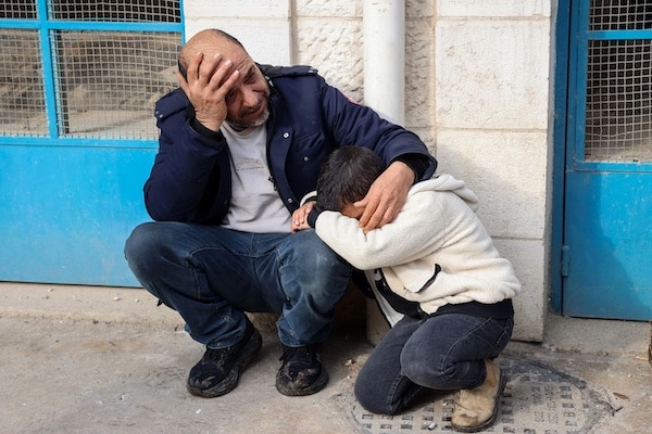  | Palestinians mourn outside the Jenin governmental hospital after several people were killed during an Israeli air strike on the occupied West Bank citys refugee camp on 16 January 2025 AFPZain Jaafar | MR Online