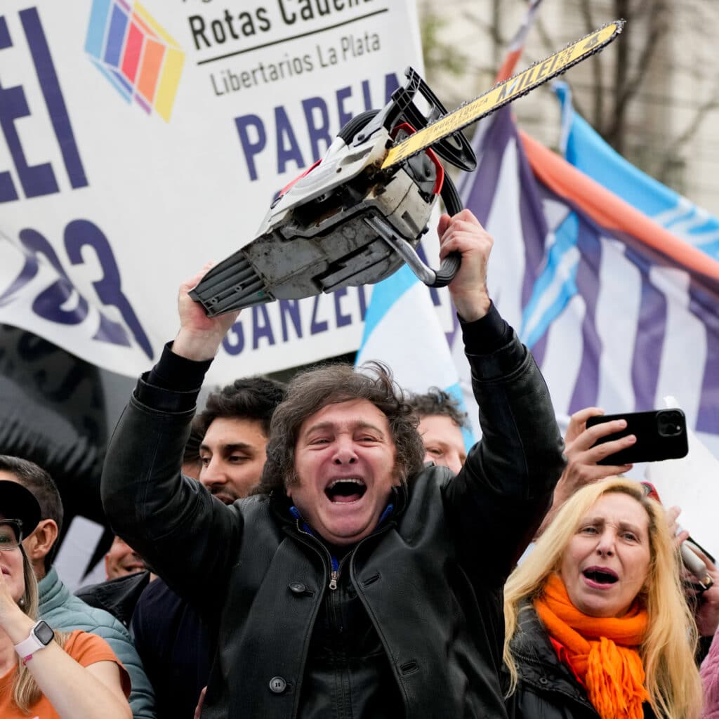 Then presidential hopeful Javier Milei brandishes a chainsaw during a rally in La Plata Argentina Sept 12 2023 Natacha Pisarenko | AP