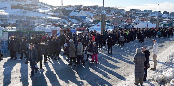  | CRUNCH TIME Voters queue outside a polling station in Nuuk Greenland on Tuesday | MR Online