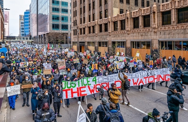 MR Online | A march through downtown Minneapolis calling for justice for George Floyd on April 19 2021 during jury deliberations in the Derek Chauvin trial Credit Wikimedia Commons | MR Online