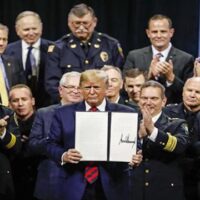 President Donald Trump in 2019 at the International Chiefs of Police Association meeting in Chicago. Public domain.