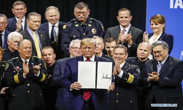 | President Donald Trump in 2019 at the International Chiefs of Police Association meeting in Chicago Public domain | MR Online