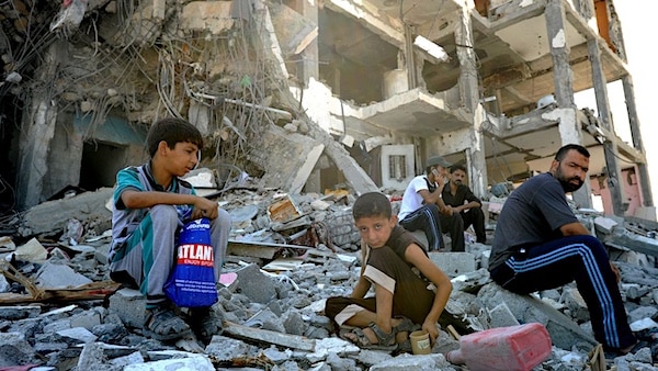 MR Online | Palestinians after an Israeli air strike in the northern Gaza Strip Photo by UN PhotoShareef Sarhan  CC BY NC ND 20 | MR Online