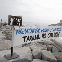 A banner at a memorial rally for victims of the 2014 massacre of migrants at Tarajal, 2021.