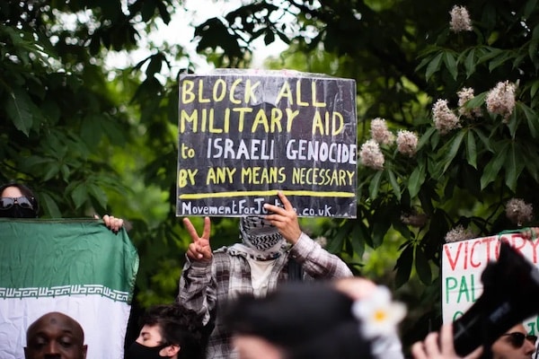 MR Online | People taking part in a demonstration organised by the Palestinian Youth Movement Britain PYM near the Israeli embassy in London June 13 2025 | MR Online