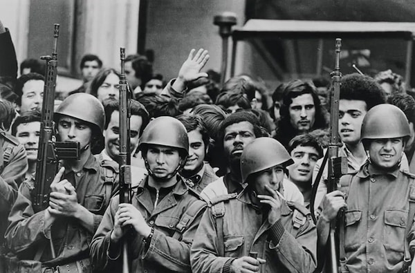 MR Online | Soldiers with citizens following the overthrow of the government on 25 April 1974 in Lisbon Portugal CREDIT Alfredo Cunha | MR Online