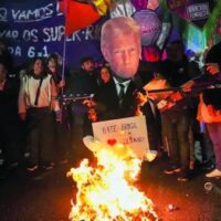 Protesters in Brazil burned an effigy of Donald Trump as they gathered to condemn 50% U.S. tariffs announced for Brazilian goods, which Trump has linked to the coup trial of his political ally, former Brazilian President Jair Bolsonaro.